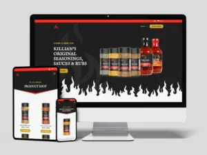 A computer, tablet, and phone display a website featuring Killian's seasonings, sauces, and rubs with black and red design elements.